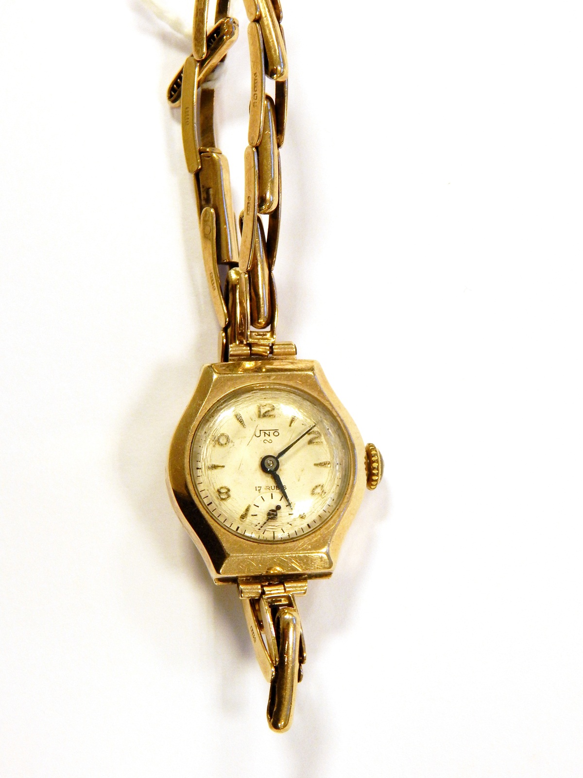 Uno 9ct gold lady's wristwatch with silvered dial and subsidiary seconds hand,