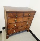 Mahogany chest of two short and three long graduated drawers, with cockbead borders,