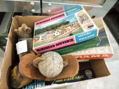 A quantity of vintage puzzles and games including Waddington's 'Campaign', a 'nodding' dog' etc.