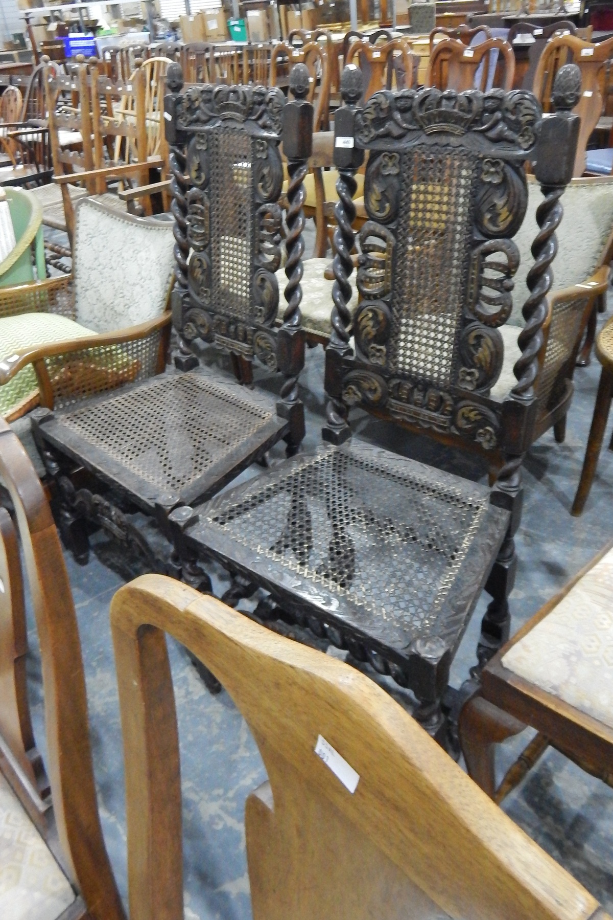 Pair of 19th century carved oak dining chair with scroll and crown top rails, acorn finials,