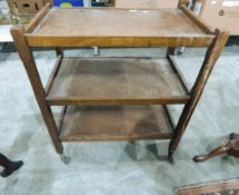 20th century oak three-tier tea trolley on square supports and castors,