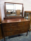 Edwardian dressing chest of two short and two long graduated drawers with mirror back,