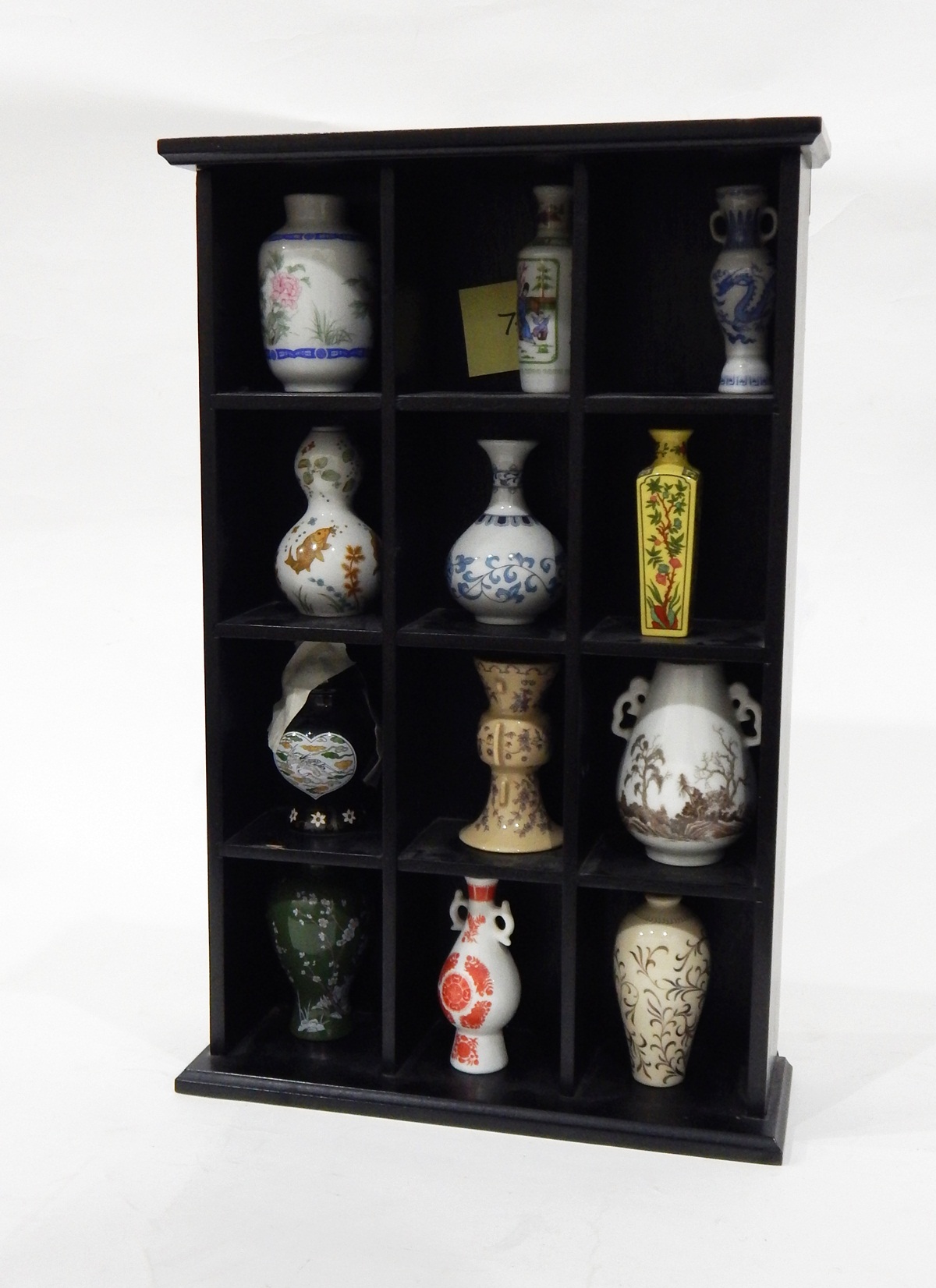 Black collectors shelf unit and contents of 12 modern Japanese miniature porcelain vases