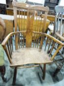 18th century Windsor combback hardwood armchair having solid splat with pierced heart shape on the