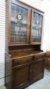 20th century stained beechwood glazed display cabinet with Rennie MacIntosh style stained glass