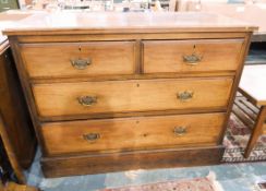 Edwardian walnut chest of two short and 2 long drawers on plinth base