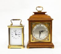 Carriage clock in lacquered brass case, the dial with Roman numerals and inscribed "Martin & Co,