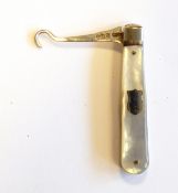 Lady's silver button hook with mother-of-pearl scales,