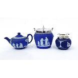 Wedgwood blue jasperware teapot decorated with classical figures,