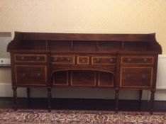 George III mahogany sideboard, possible Irish, having raised three-quarter gallery to top,