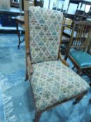 Edwardian oak framed salon chair with floral fabric cover