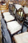 Set of three Hepplewhite-style mahogany shield-back dining chairs with serpentine fronted seats and