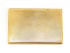 9ct gold cigarette case of engine-turned rectangular form with sliding opening mechanism, 13cm long,