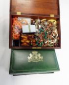 Mahogany box and contents of assorted costume jewellery including a row of malachite beads,
