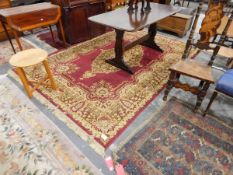 Eastern style wool carpet, red ground central foliate medallion,