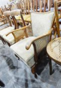 Pair of canework and upholstered Bergere-type armchairs and another (3)