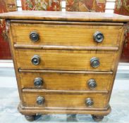 19th century mahogany chest of four short dummy drawers to reveal commode, and lid,