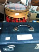 The Skotch Kooler ice bucket, a vintage Singer Portable Electric Sewing Machine with instructions,