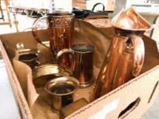 Various metalware including a copper ewer, copper jugs, a brass chamber stick etc.