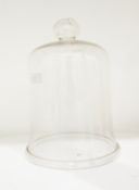 19th century glass dome with knop handle and folded rim,