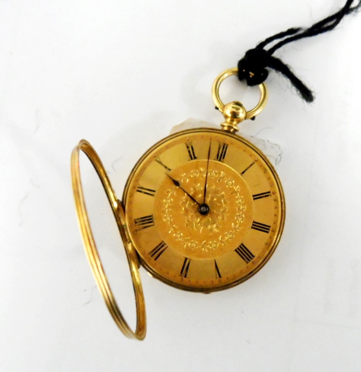 Gold Swiss open-faced fob watch, the case marked 18K with floral engraving to the gilt dial,