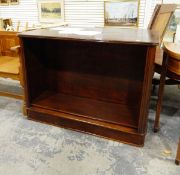 Pair of 20th century stained wood open bookcases on plinth base,