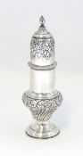 A late Victorian silver sugar caster of baluster form with spirally wrythen and foliate decoration