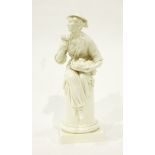 Modern white porcelain model of a lady with a basket of flowers, seated on a pillar,