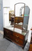 Early 20th century mahogany dressing chest with mirror over two short and one long drawer,