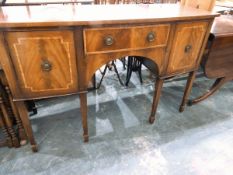Reproduction Georgian-style mahogany cross-banded bow-front sideboard on six square tapering