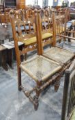Two continental ladderback dining chairs with rush seats, shaped rails,