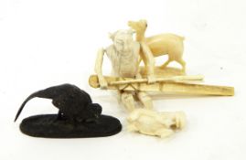 Small bronze model of a pheasant, a miniature brass candlestick,