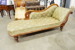 Victorian mahogany chaise longue with scroll carved ends, pierced scroll padded back,