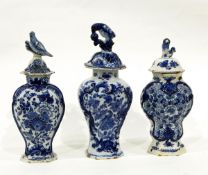 Antique blue and white Delft vase of baluster form decorated with flowers,