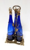 EPNS topped flash blue glass bottles on stand
