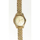 Gentleman's Rotary Maximum 9ct gold cased wristwatch with silvered dial and a gold link chain
