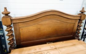 Victorian mahogany headboard with carved top rail,