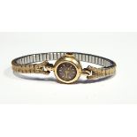 Lady's gold Ulysse Nardin bracelet watch, the case marked 14K,