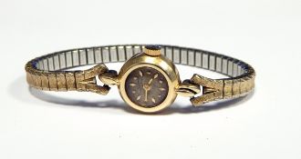 Lady's gold Ulysse Nardin bracelet watch, the case marked 14K,