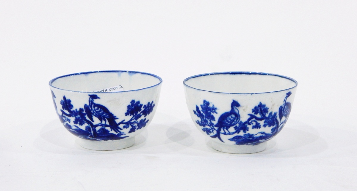 Pair of 18th century blue and white tea bowls and saucers, probably Worcester,