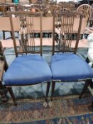 Pair of Edwardian mahogany dining chairs with boxwood and satin stringing,