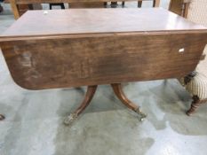 19th century mahogany breakfast table, rectangular, on ring turned column, outswept supports,