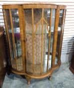 20th century walnut shaped front display cabinet with glazed and astragal panels,