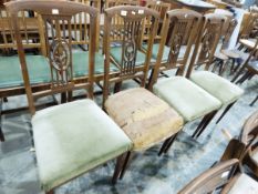 Set of four Edwardian mahogany dining chairs with satinwood stringing and shaped splats,