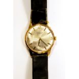 Longines gold wristwatch with silvered dial and leather strap,