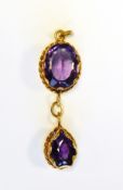 18ct gold and amethyst pendant the oval mixed cut amethyst with pear-shaped amethyst drop beneath,