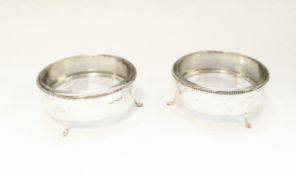 Pair of Walker & Hall silver and glass preserve dishes,