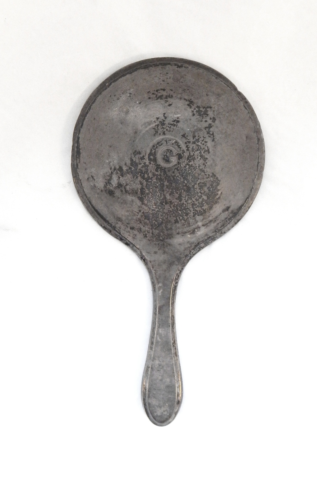 A silver backed hand mirror,