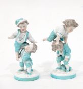 Pair of continental porcelain ornaments, possible Samson, of children playing at acrobatics,