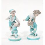 Pair of continental porcelain ornaments, possible Samson, of children playing at acrobatics,